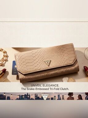 GUESS Beige Snake-Embossed Clutch